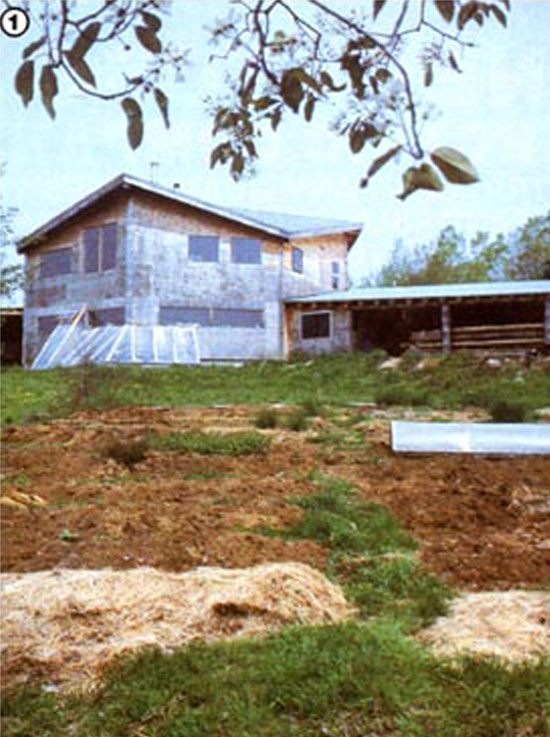 The Larson-Darnell home is designed to incorporate a wraparound greenhouse on its southern point.